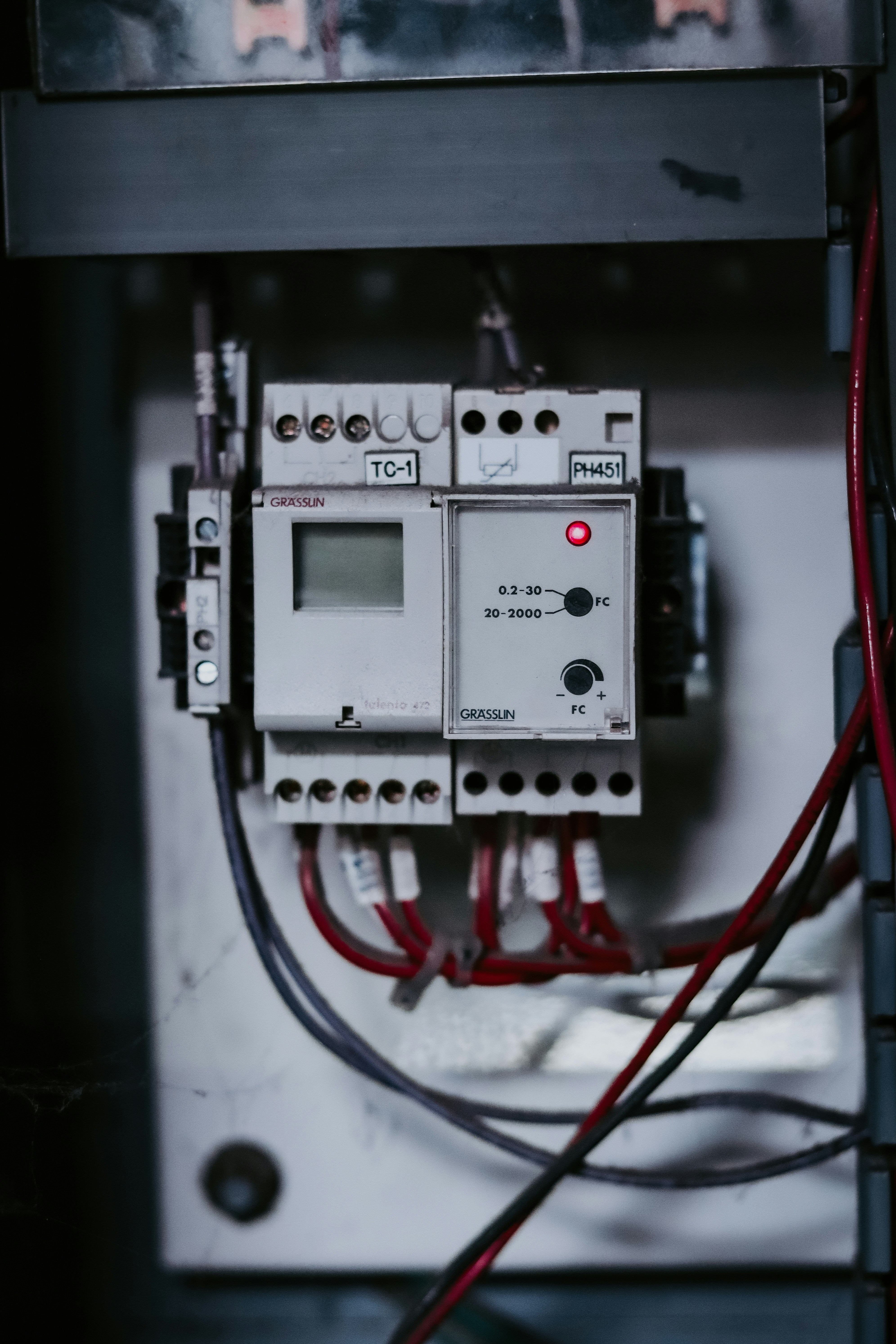 Electrician installing a circuit breaker panel