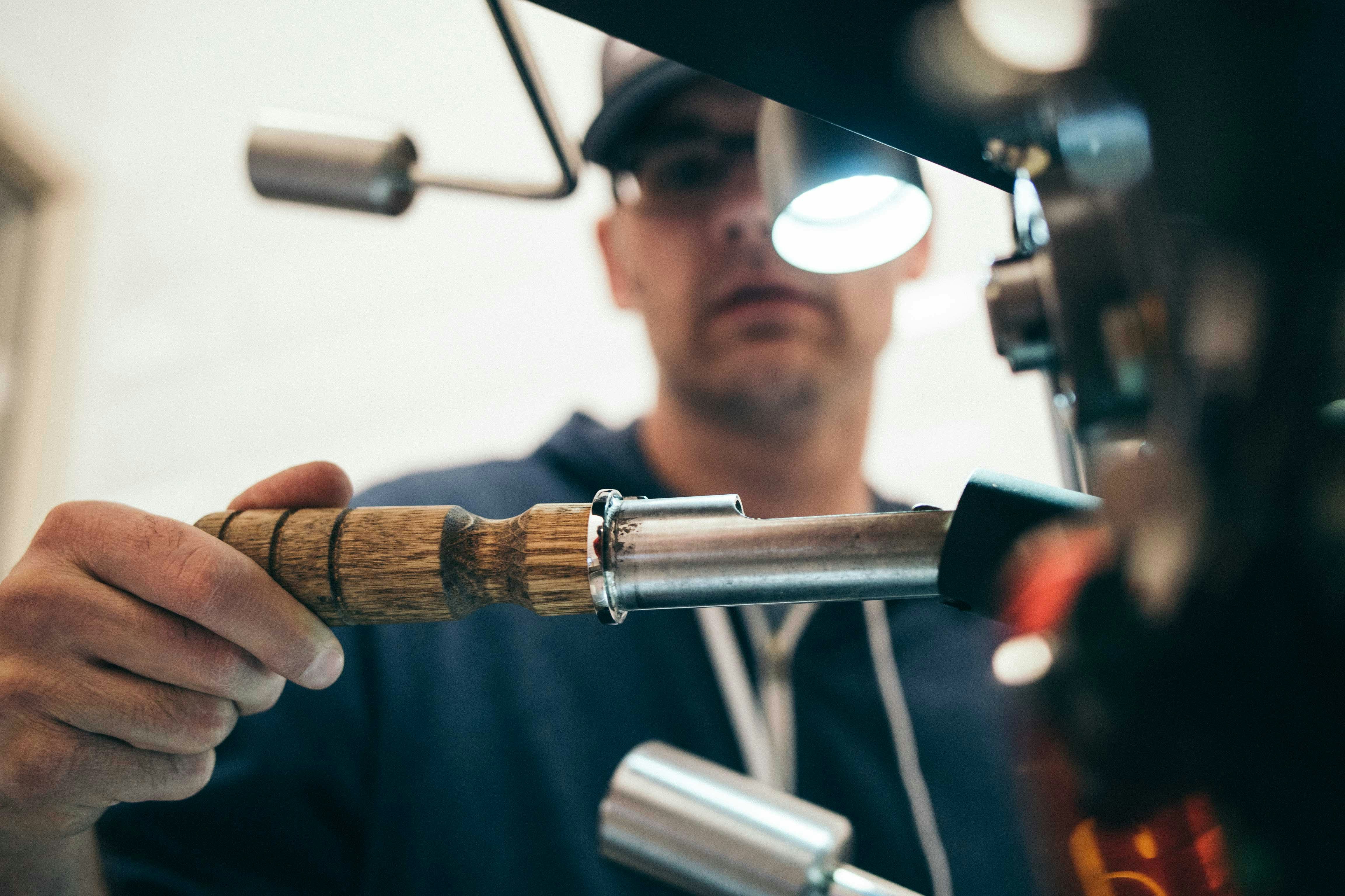 Handyman assembling furniture in a living room