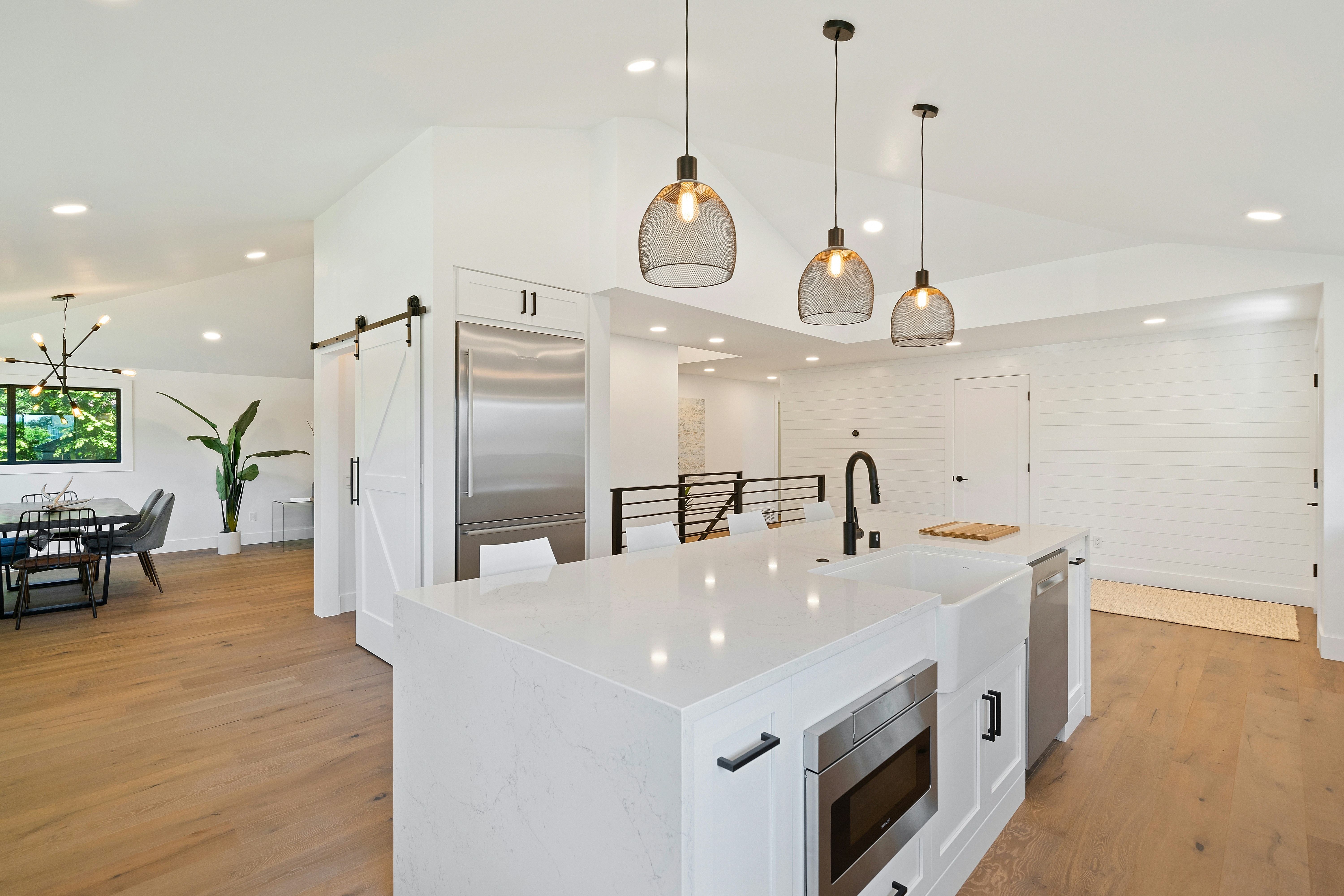 Renovated modern kitchen with new cabinets and tiles